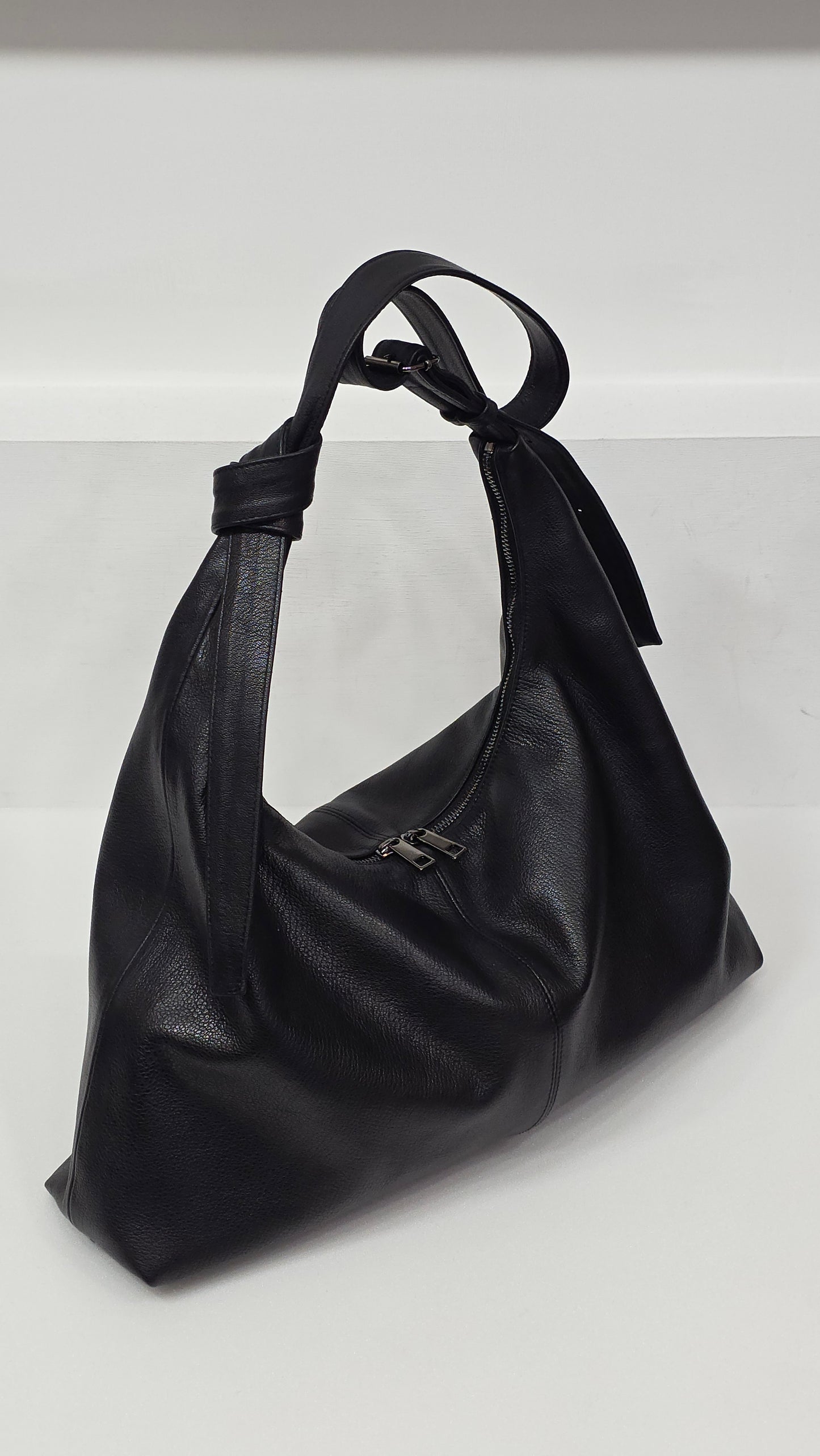 Arc Cross Black